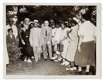 (RELIGION.) BAKER, GEORGE FATHER DIVINE. Group of 11 early press photographs of members of Father Divines church.